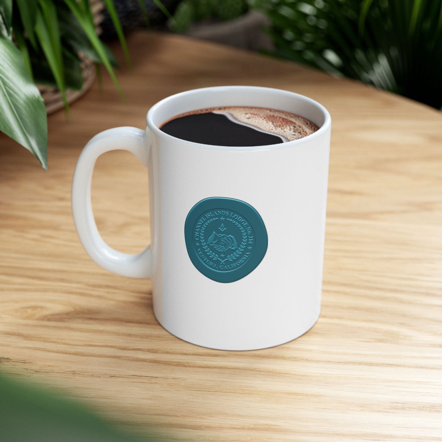 White ceramic mug featuring two-sided custom wax seal design with Channel Islands Lodge logo, 11oz or 15oz capacity.